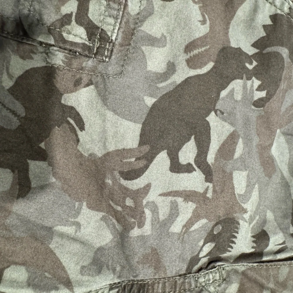 New without tags. Carters Dino print shorts size 8